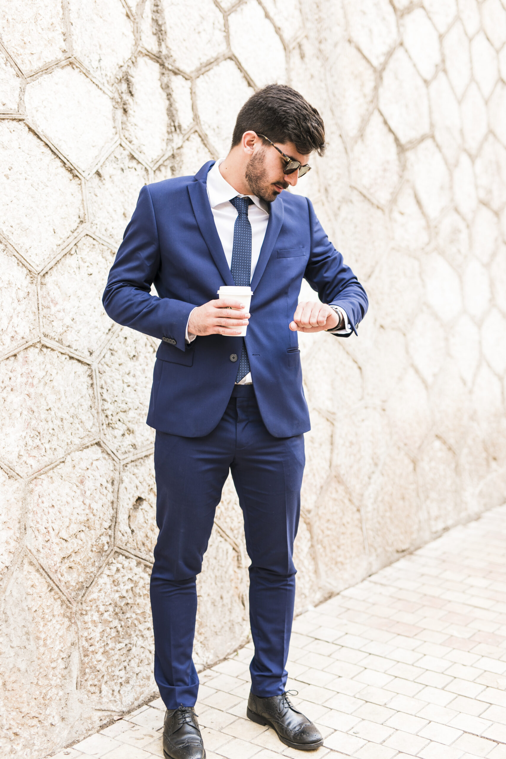 business-man-looking-his-watch-ezgif.com-resize (1)